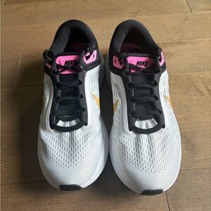 Nike Women’s White Running Sneakers with Black, Pink & Gold Accents